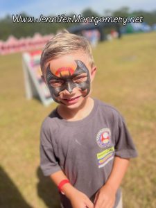 Batman Face Paint in Brooksville Florida at The Blueberry Festival by CrazyFaces FacePainting and Body Art for parties and events from Philadelphia PA to Key West, FL www.jennifermontgomery.net
